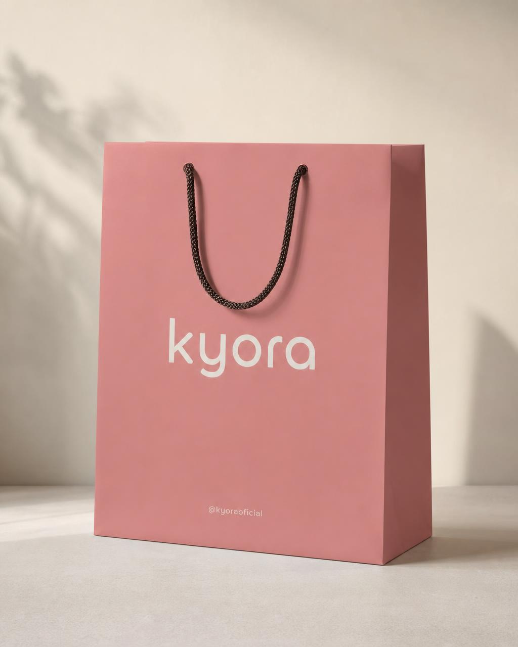 Bolsa de compras rosa de Kyora con el ritual completo